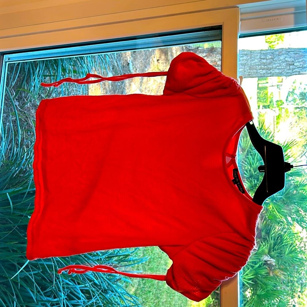 Very cute top gently worn no rips no tears no hangs.